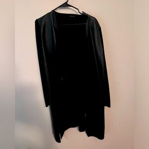 Long, leather/suede, long sleeves. Fits small/medium. Like new, smoke free home!